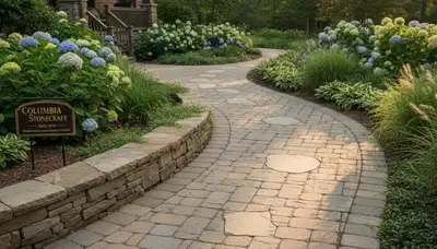 Curved stone paver pathway by Chop Chop Landscaping in Columbia, MO showcasing expert landscape design